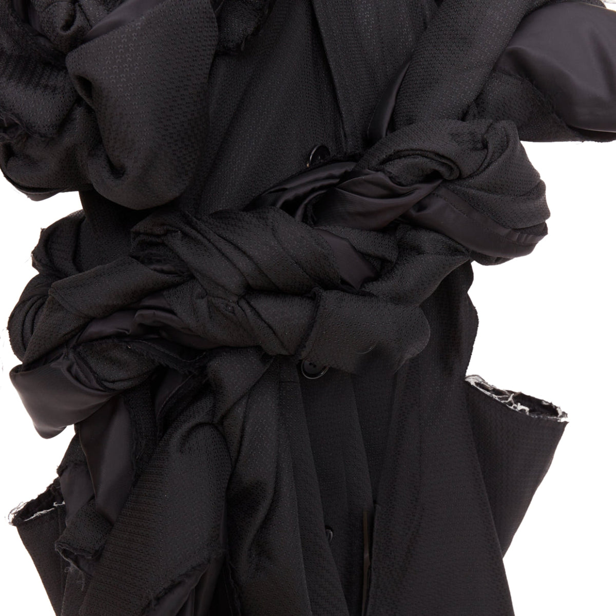 Women's Comme des Garcons black textured 3D multi knots cut out coat